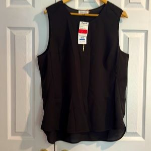Never worn Calvin Klein tank top/shell.  Size XL, black with gold zip detail